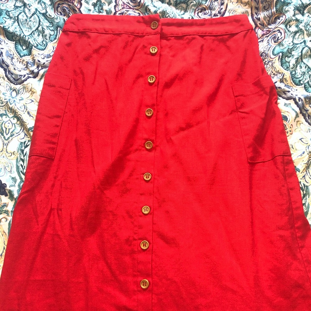 Ruby red vintage button up skirt.
